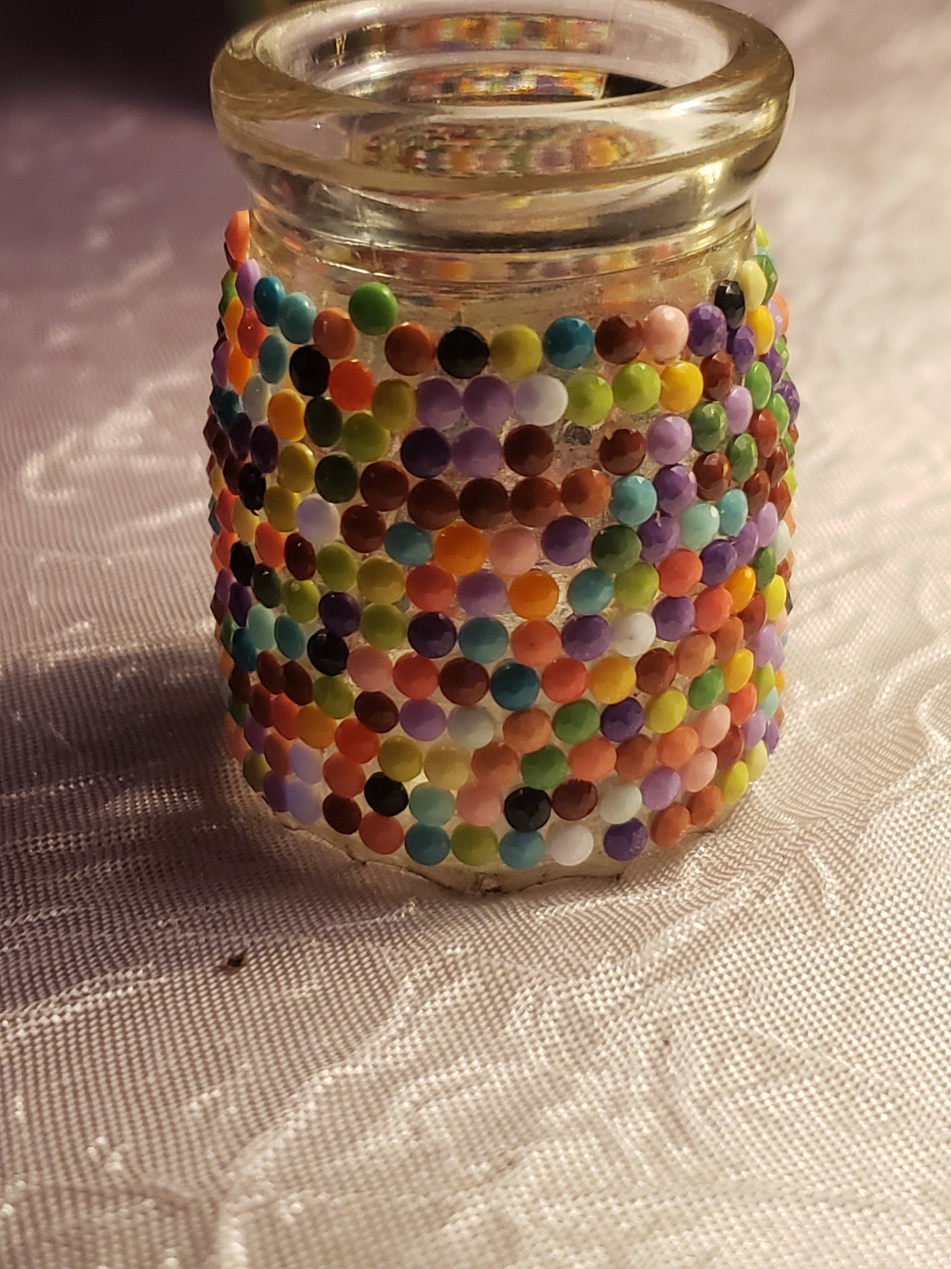 Multi colored diamond jar.